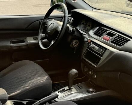 Серый Мицубиси Лансер, объемом двигателя 1.6 л и пробегом 220 тыс. км за 4400 $, фото 10 на Automoto.ua