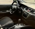 Серый Мицубиси Лансер, объемом двигателя 1.6 л и пробегом 220 тыс. км за 4400 $, фото 10 на Automoto.ua