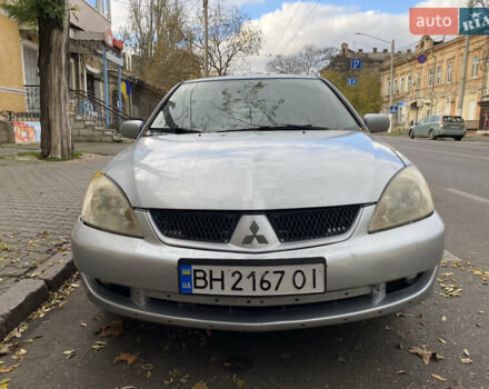 Серый Мицубиси Лансер, объемом двигателя 1.6 л и пробегом 444 тыс. км за 3400 $, фото 1 на Automoto.ua