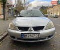 Серый Мицубиси Лансер, объемом двигателя 1.6 л и пробегом 444 тыс. км за 3400 $, фото 1 на Automoto.ua