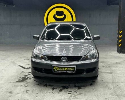 Серый Мицубиси Лансер, объемом двигателя 1.6 л и пробегом 300 тыс. км за 4600 $, фото 1 на Automoto.ua