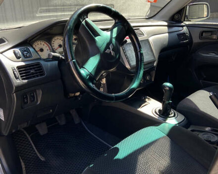 Сірий Міцубісі Lancer, об'ємом двигуна 1.6 л та пробігом 200 тис. км за 4400 $, фото 11 на Automoto.ua