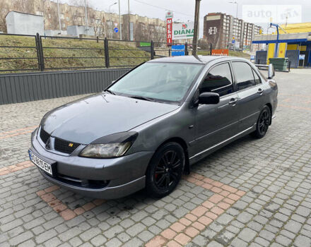 Сірий Міцубісі Lancer, об'ємом двигуна 1.58 л та пробігом 228 тис. км за 4300 $, фото 3 на Automoto.ua