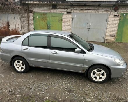 Сірий Міцубісі Lancer, об'ємом двигуна 1.6 л та пробігом 270 тис. км за 2900 $, фото 6 на Automoto.ua
