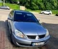 Сірий Міцубісі Lancer, об'ємом двигуна 1.6 л та пробігом 270 тис. км за 3800 $, фото 1 на Automoto.ua