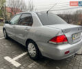 Сірий Міцубісі Lancer, об'ємом двигуна 1.58 л та пробігом 333 тис. км за 2999 $, фото 4 на Automoto.ua