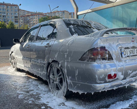 Сірий Міцубісі Lancer, об'ємом двигуна 1.84 л та пробігом 190 тис. км за 3500 $, фото 11 на Automoto.ua