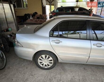 Сірий Міцубісі Lancer, об'ємом двигуна 1.58 л та пробігом 186 тис. км за 4300 $, фото 8 на Automoto.ua