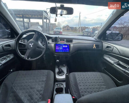 Серый Мицубиси Лансер, объемом двигателя 1.6 л и пробегом 213 тыс. км за 4500 $, фото 7 на Automoto.ua