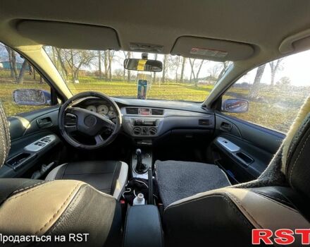 Сірий Міцубісі Lancer, об'ємом двигуна 1.6 л та пробігом 250 тис. км за 4000 $, фото 3 на Automoto.ua