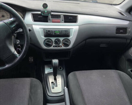 Мицубиси Лансер 2006 в Погребище на Automoto.ua Серый Мицубиси Лансер, объемом двигателя 2 л и пробегом 320 тыс. км за 3300 $, фото 9 на Automoto.ua