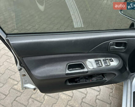 Сірий Міцубісі Lancer, об'ємом двигуна 1.6 л та пробігом 223 тис. км за 3900 $, фото 12 на Automoto.ua