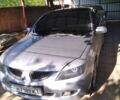 Сірий Міцубісі Lancer, об'ємом двигуна 2 л та пробігом 225 тис. км за 5180 $, фото 1 на Automoto.ua