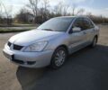 Сірий Міцубісі Lancer, об'ємом двигуна 1.6 л та пробігом 340 тис. км за 3000 $, фото 1 на Automoto.ua