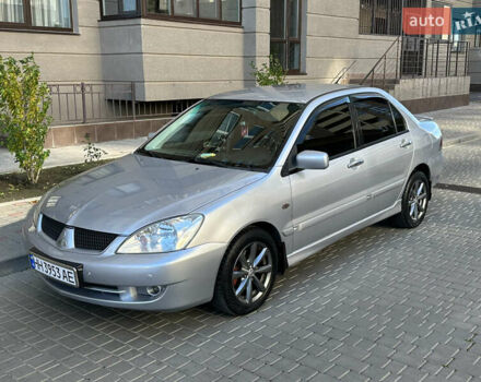 Серый Мицубиси Лансер, объемом двигателя 1.58 л и пробегом 244 тыс. км за 4950 $, фото 8 на Automoto.ua
