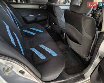 Сірий Міцубісі Lancer, об'ємом двигуна 1.58 л та пробігом 186 тис. км за 4300 $, фото 6 на Automoto.ua