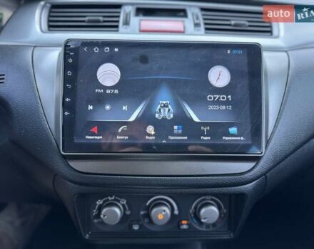 Серый Мицубиси Лансер, объемом двигателя 0 л и пробегом 182 тыс. км за 6500 $, фото 18 на Automoto.ua