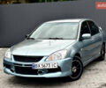 Сірий Міцубісі Lancer, об'ємом двигуна 1.58 л та пробігом 354 тис. км за 2999 $, фото 1 на Automoto.ua