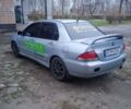 Сірий Міцубісі Lancer, об'ємом двигуна 1.58 л та пробігом 264 тис. км за 3200 $, фото 5 на Automoto.ua