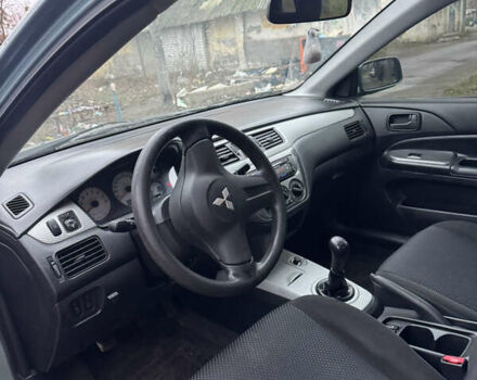 Сірий Міцубісі Lancer, об'ємом двигуна 1.6 л та пробігом 240 тис. км за 3000 $, фото 15 на Automoto.ua