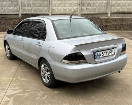 Сірий Міцубісі Lancer, об'ємом двигуна 1.6 л та пробігом 220 тис. км за 2450 $, фото 3 на Automoto.ua