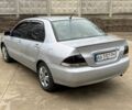 Сірий Міцубісі Lancer, об'ємом двигуна 1.6 л та пробігом 220 тис. км за 2450 $, фото 3 на Automoto.ua