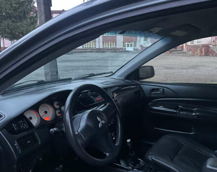 Серый Мицубиси Лансер, объемом двигателя 1.58 л и пробегом 240 тыс. км за 2650 $, фото 8 на Automoto.ua