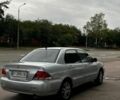 Сірий Міцубісі Lancer, об'ємом двигуна 1.6 л та пробігом 274 тис. км за 2690 $, фото 3 на Automoto.ua