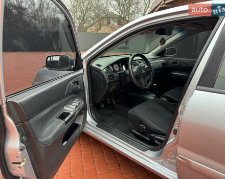 Серый Мицубиси Лансер, объемом двигателя 1.6 л и пробегом 242 тыс. км за 4300 $, фото 8 на Automoto.ua