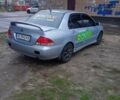 Сірий Міцубісі Lancer, об'ємом двигуна 1.6 л та пробігом 264 тис. км за 3200 $, фото 2 на Automoto.ua