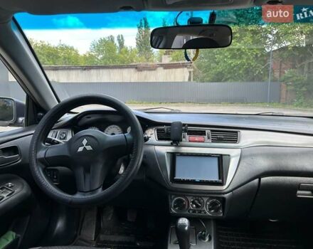 Серый Мицубиси Лансер, объемом двигателя 1.58 л и пробегом 160 тыс. км за 4600 $, фото 3 на Automoto.ua