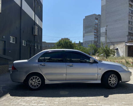 Сірий Міцубісі Lancer, об'ємом двигуна 1.6 л та пробігом 200 тис. км за 4400 $, фото 7 на Automoto.ua