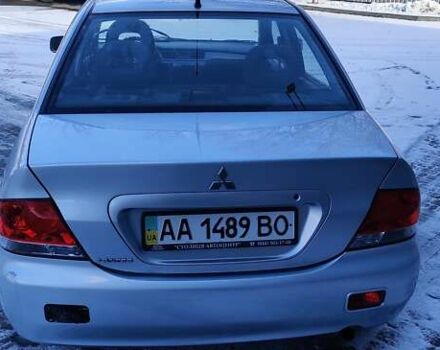 Серый Мицубиси Лансер, объемом двигателя 1.6 л и пробегом 163 тыс. км за 5000 $, фото 9 на Automoto.ua