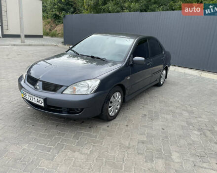 Сірий Міцубісі Lancer, об'ємом двигуна 1.58 л та пробігом 162 тис. км за 4650 $, фото 8 на Automoto.ua