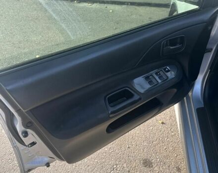 Серый Мицубиси Лансер, объемом двигателя 1.6 л и пробегом 170 тыс. км за 3700 $, фото 7 на Automoto.ua