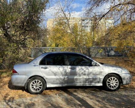 Серый Мицубиси Лансер, объемом двигателя 1.6 л и пробегом 204 тыс. км за 3999 $, фото 3 на Automoto.ua