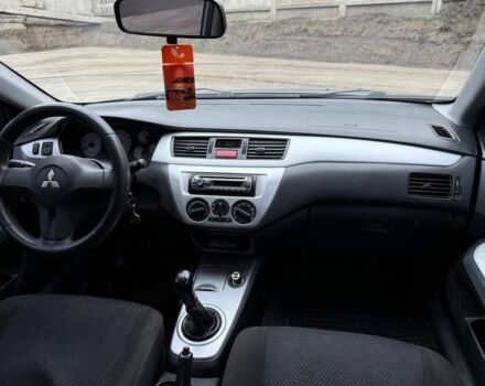 Сірий Міцубісі Lancer, об'ємом двигуна 1.6 л та пробігом 220 тис. км за 2450 $, фото 7 на Automoto.ua