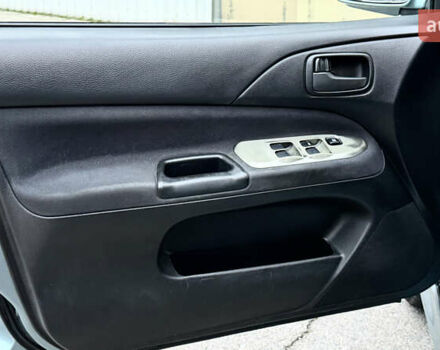 Сірий Міцубісі Lancer, об'ємом двигуна 1.58 л та пробігом 275 тис. км за 4600 $, фото 12 на Automoto.ua
