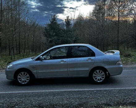 Сірий Міцубісі Lancer, об'ємом двигуна 1.58 л та пробігом 216 тис. км за 4750 $, фото 7 на Automoto.ua