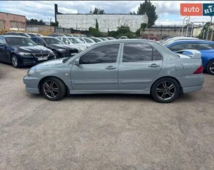 Сірий Міцубісі Lancer, об'ємом двигуна 2 л та пробігом 263 тис. км за 4300 $, фото 5 на Automoto.ua