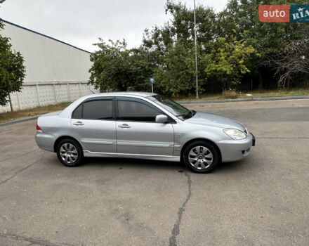 Серый Мицубиси Лансер, объемом двигателя 1.58 л и пробегом 183 тыс. км за 4800 $, фото 16 на Automoto.ua