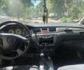 Серый Мицубиси Лансер, объемом двигателя 1.6 л и пробегом 140 тыс. км за 5000 $, фото 4 на Automoto.ua