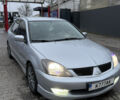 Сірий Міцубісі Lancer, об'ємом двигуна 2 л та пробігом 256 тис. км за 6500 $, фото 1 на Automoto.ua