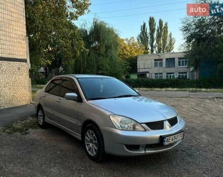 Сірий Міцубісі Lancer, об'ємом двигуна 1.6 л та пробігом 225 тис. км за 4200 $, фото 2 на Automoto.ua