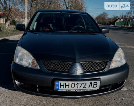 Сірий Міцубісі Lancer, об'ємом двигуна 1.6 л та пробігом 305 тис. км за 5200 $, фото 1 на Automoto.ua