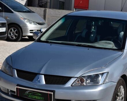 Серый Мицубиси Лансер, объемом двигателя 1.6 л и пробегом 230 тыс. км за 4550 $, фото 6 на Automoto.ua