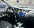 Сірий Міцубісі Lancer, об'ємом двигуна 1.58 л та пробігом 186 тис. км за 4699 $, фото 7 на Automoto.ua