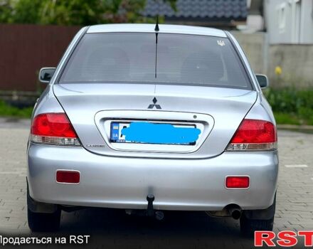 Сірий Міцубісі Lancer, об'ємом двигуна 1.6 л та пробігом 200 тис. км за 4000 $, фото 1 на Automoto.ua