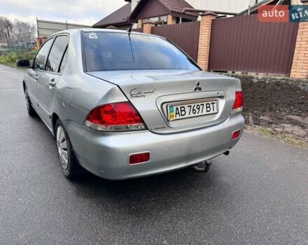 Сірий Міцубісі Lancer, об'ємом двигуна 1.58 л та пробігом 333 тис. км за 2999 $, фото 4 на Automoto.ua
