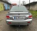 Сірий Міцубісі Lancer, об'ємом двигуна 1.6 л та пробігом 270 тис. км за 2900 $, фото 4 на Automoto.ua